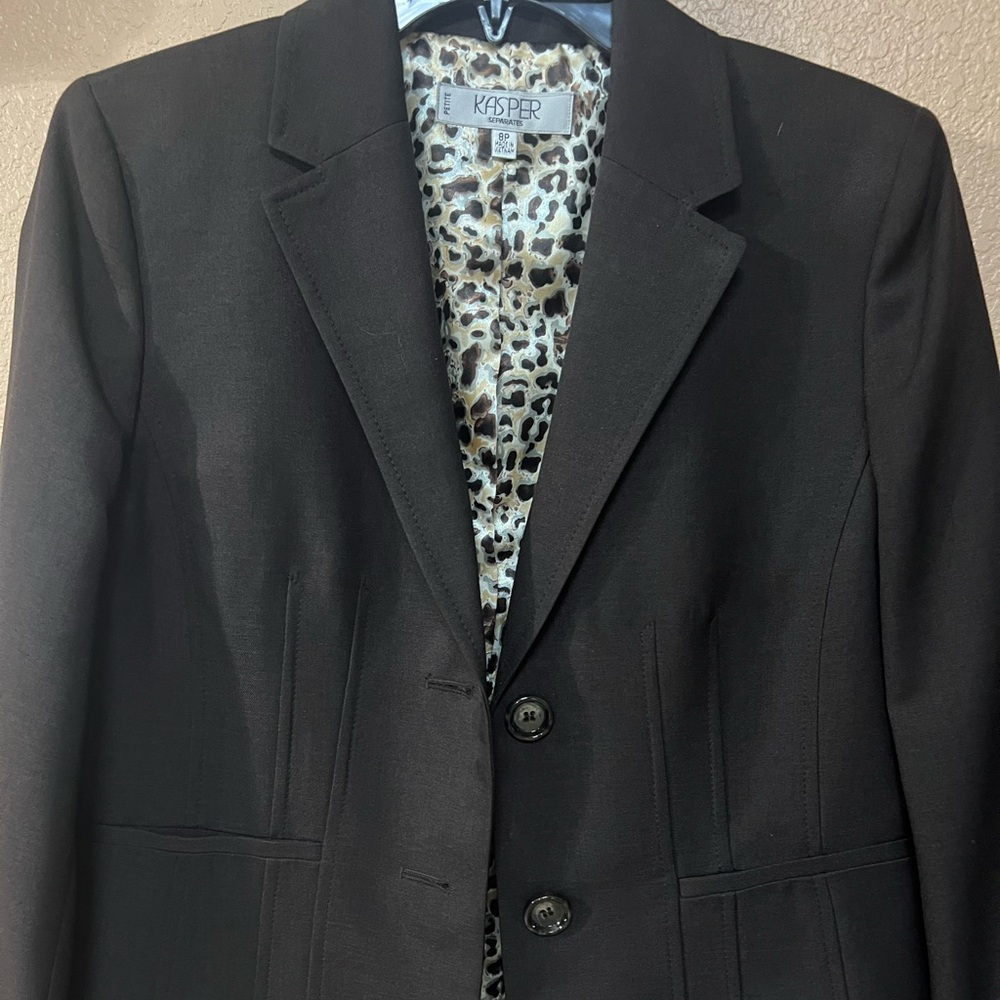 Ladies brown animal printed lined blazer.